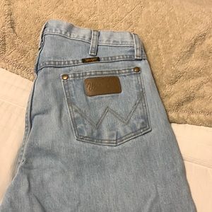 Men’s light wash Wrangler jeans.  No tears or stains, new condition.